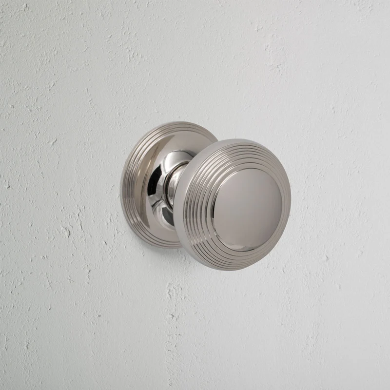 Poplar Sprung Door Knob - Polished Nickel