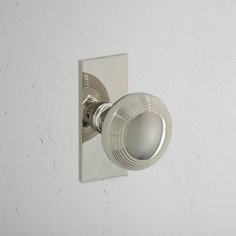 Poplar Short Plate Unsprung Door Knob - Polished Nickel