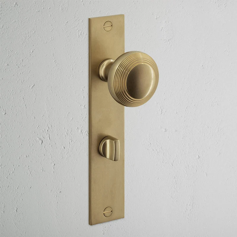 Poplar Long Plate Sprung Door Knob & Thumbturn - Antique Brass