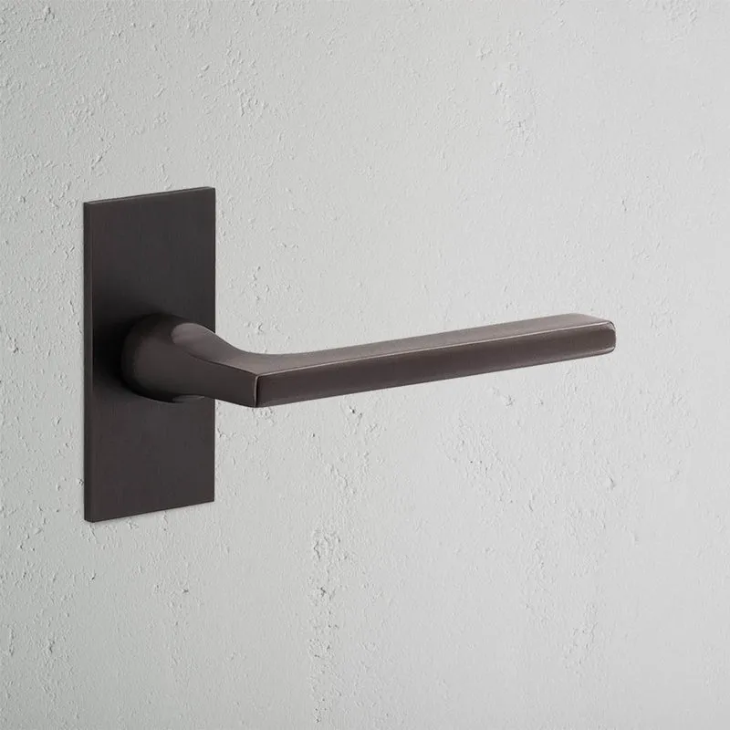 Clayton Short Plate Sprung Door Handle - Bronze