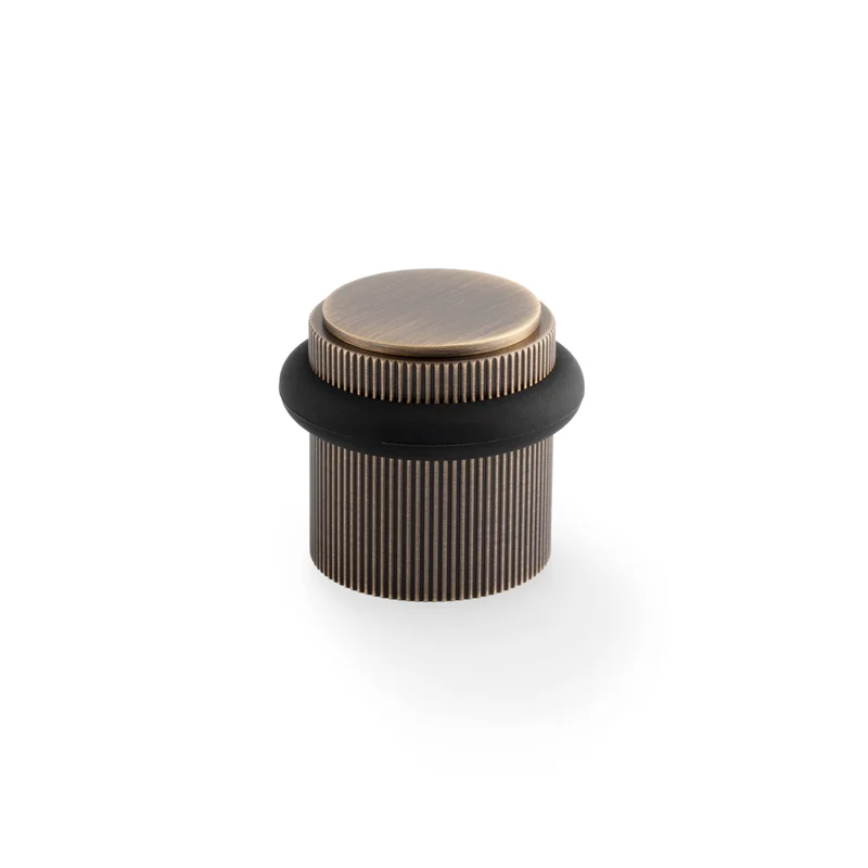 Brunel Floor Reeded | Dörrstopp i Antik Mässing